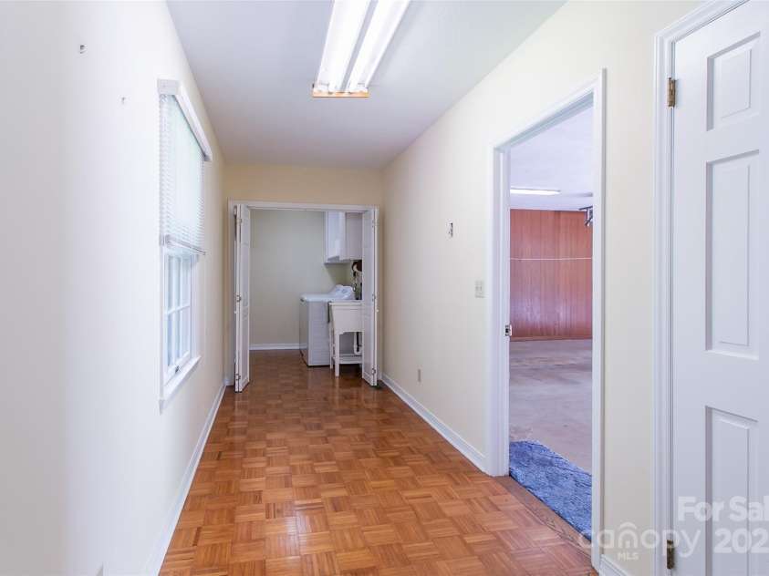 185 Oak Ridge Drive, Clyde, NC 28721.  MLS# CAR4289046, YatesRealty ID 18749. Mud Room Area off Kitchen & Main Garage