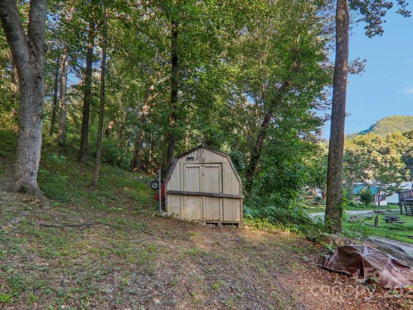 138 Buddy Lane, Chimney Rock, NC 28720.  MLS# CAR4326250, YatesRealty ID 1875. 