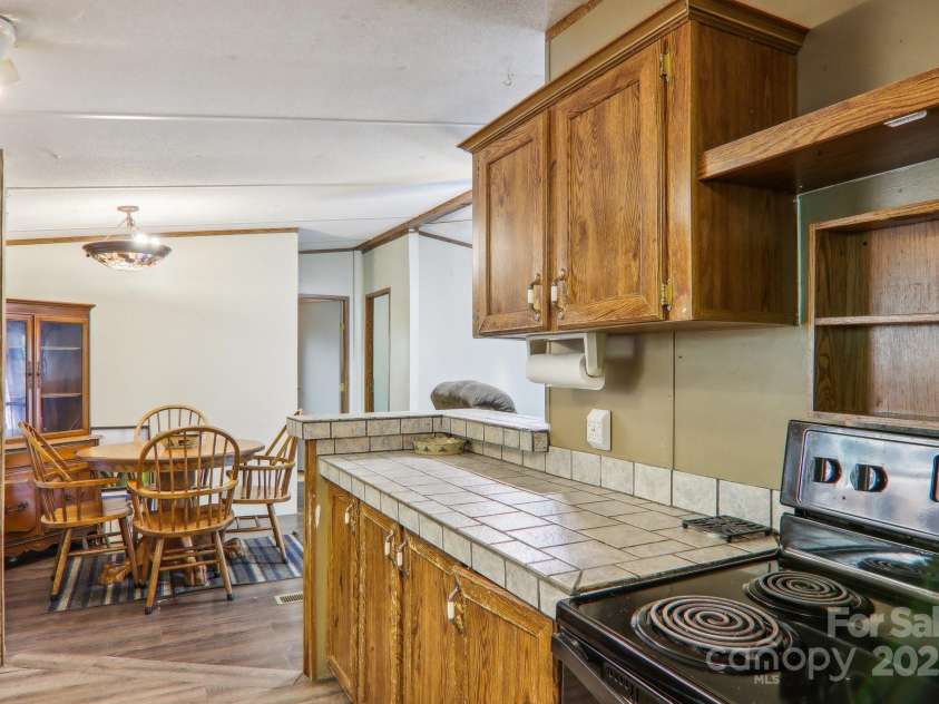 138 Buddy Lane, Chimney Rock, NC 28720.  MLS# CAR4326250, YatesRealty ID 1875. 