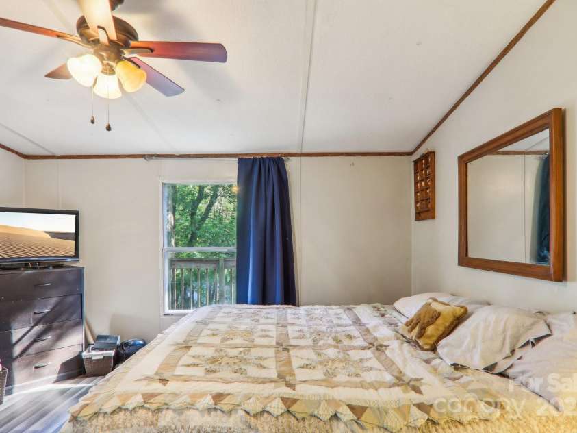 138 Buddy Lane, Chimney Rock, NC 28720.  MLS# CAR4326250, YatesRealty ID 1875. King bed