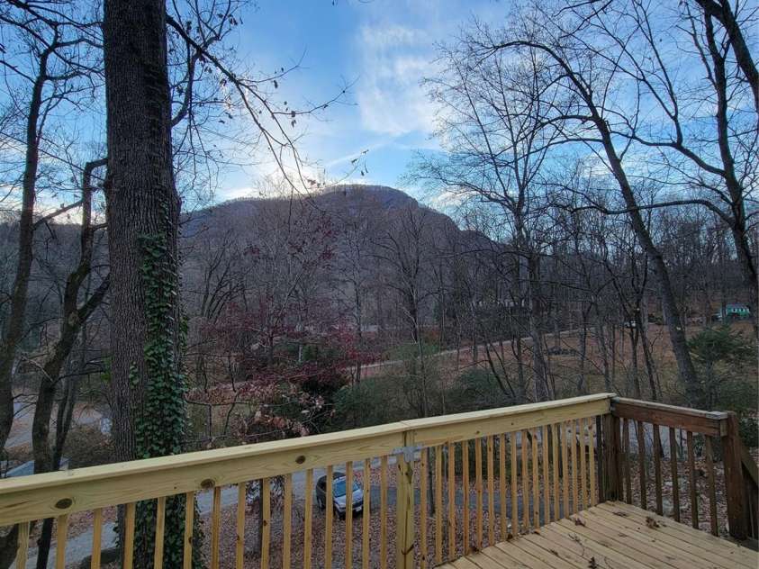 138 Buddy Lane, Chimney Rock, NC 28720.  MLS# CAR4326250, YatesRealty ID 1875. New decking to enjoy mountain views