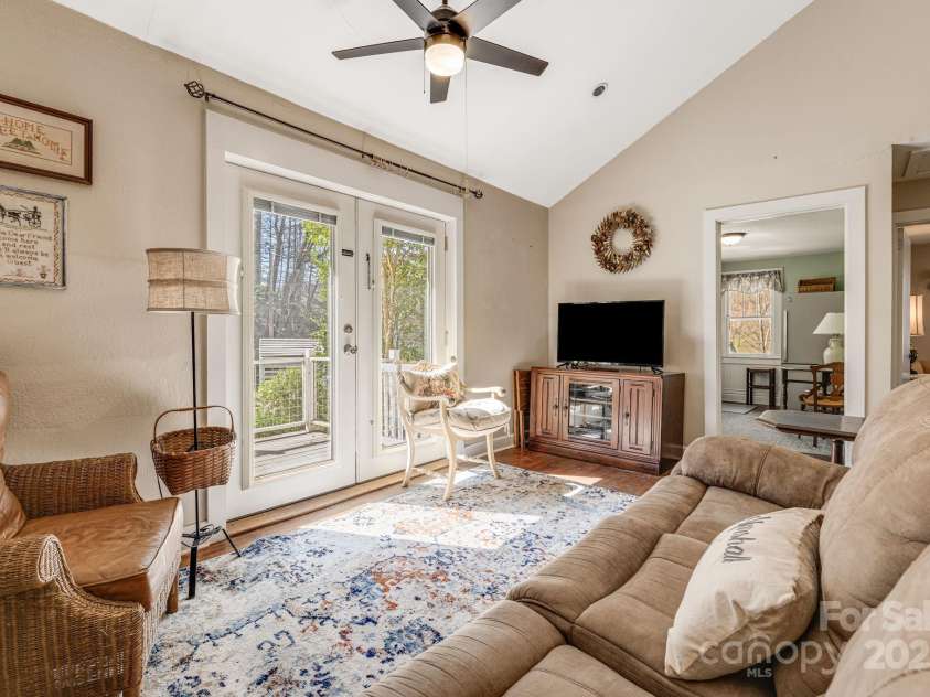 153 Skyway Drive, Marshall, NC 28753.  MLS# CAR4239069, YatesRealty ID 18756. Garage Apt Living Room
