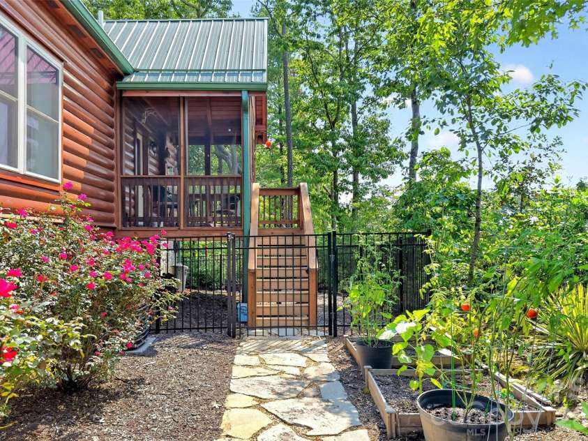 96 Boysenberry Drive, Nebo, NC 28761.  MLS# CAR4378024, YatesRealty ID 18759. Covered Back Porch