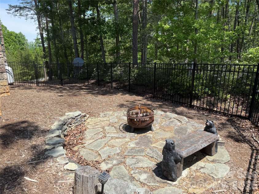 96 Boysenberry Drive, Nebo, NC 28761.  MLS# CAR4378024, YatesRealty ID 18759. Fire Pit area