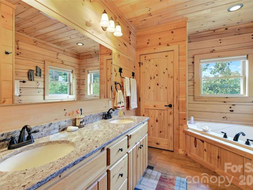 96 Boysenberry Drive, Nebo, NC 28761.  MLS# CAR4378024, YatesRealty ID 18759. Primary Bath
