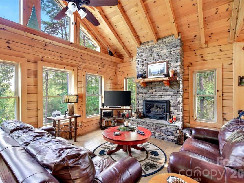 96 Boysenberry Drive, Nebo, NC 28761.  MLS# CAR4378024, YatesRealty ID 18759. Spacious living room with great views!