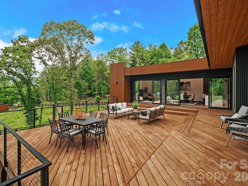 200 Manchester Way, Mills River, NC 28759.  MLS# CAR4389043, YatesRealty ID 1876. Discreet Tree Framed Mountain Backdrops