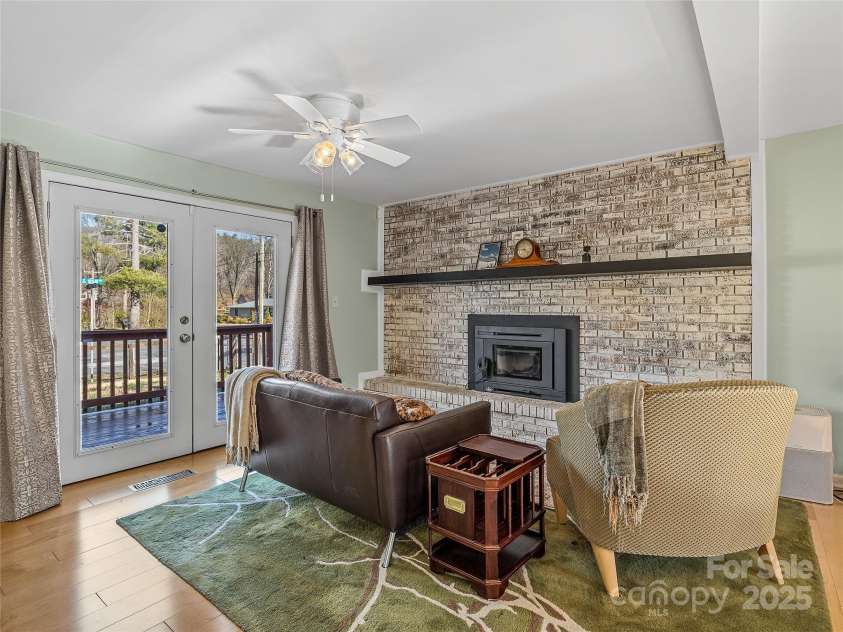 435 Thermal View Drive, Tryon, NC 28782.  MLS# CAR4334421, YatesRealty ID 1876. French doors lead to the front deck