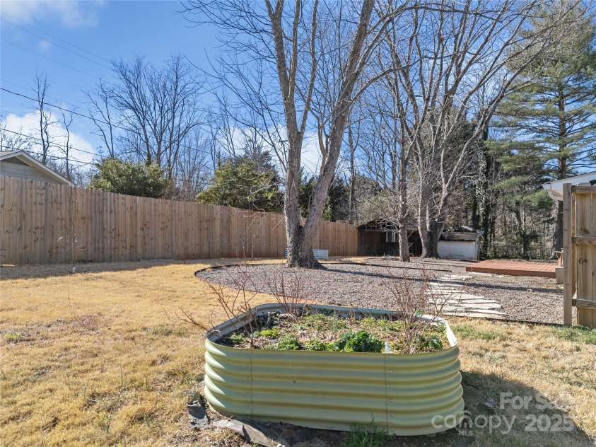 435 Thermal View Drive, Tryon, NC 28782.  MLS# CAR4334421, YatesRealty ID 1876. There are several raised garden beds