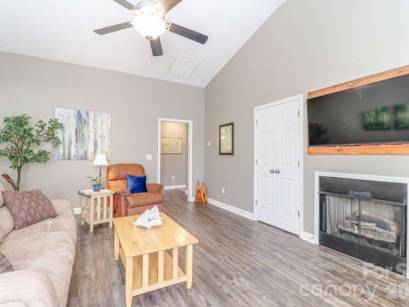 48 Olde Covington Way, Arden, NC 28704.  MLS# CAR4311026, YatesRealty ID 18761. Living Room Facing Kitchen Hall