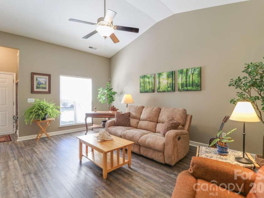 48 Olde Covington Way, Arden, NC 28704.  MLS# CAR4311026, YatesRealty ID 18761. Living Room From Kitchen Hall 2