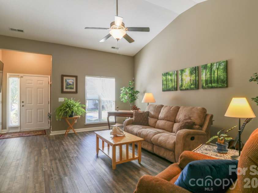 48 Olde Covington Way, Arden, NC 28704.  MLS# CAR4311026, YatesRealty ID 18761. Living Room From Kitchen Hall