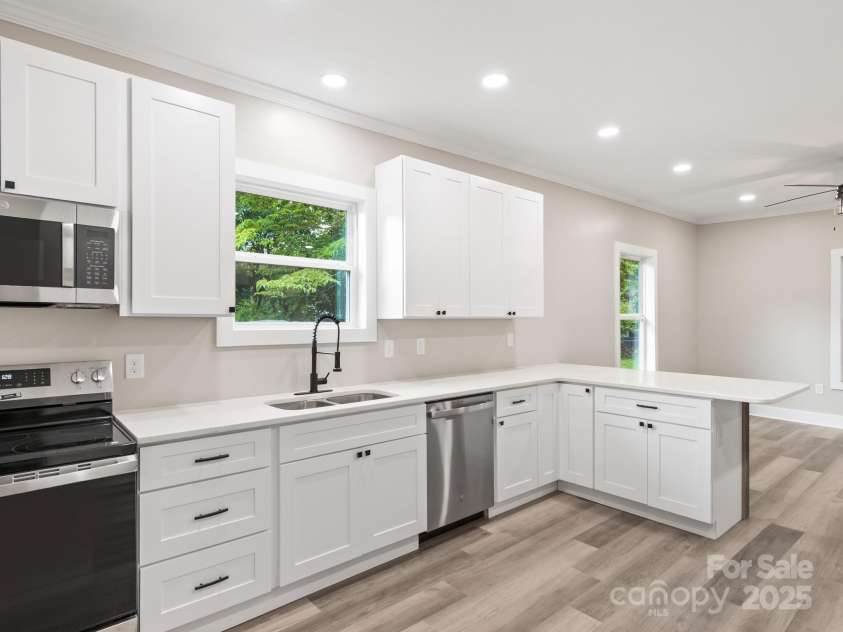 123 Edwards Avenue, Swannanoa, NC 28778.  MLS# CAR4265830, YatesRealty ID 18765. Brand new kitchen with Quartz countertops, all new cabinets, sink and appliances.