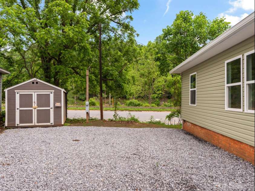123 Edwards Avenue, Swannanoa, NC 28778.  MLS# CAR4265830, YatesRealty ID 18765. Plenty of room for parking cars.