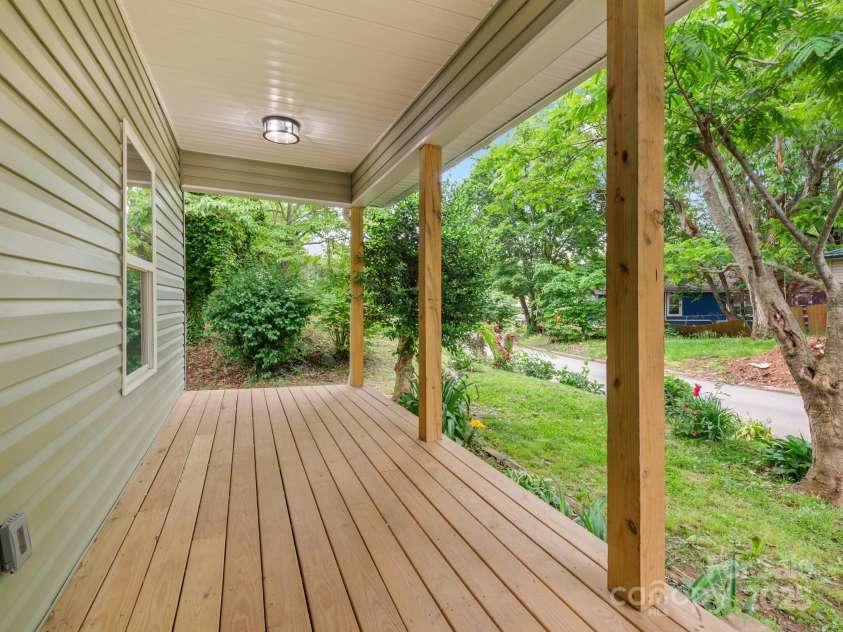 123 Edwards Avenue, Swannanoa, NC 28778.  MLS# CAR4265830, YatesRealty ID 18765. This front porch was built for sitting.