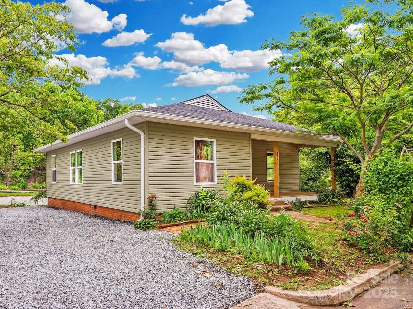 123 Edwards Avenue, Swannanoa, NC 28778.  MLS# CAR4265830, YatesRealty ID 18765. This photo was digitally edited to remove the telephone pole located in front of the house to provide a better view of the house. See other photo with telephone pole for reference.