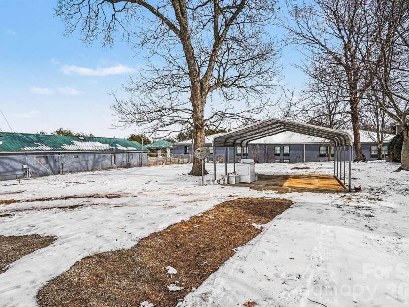 3042 Oxford Street, Claremont, NC 28610.  MLS# CAR4337240, YatesRealty ID 18766. Convienent Carport