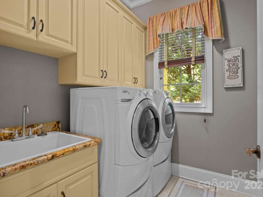 104 Golden Bell Court, Mooresville, NC 28117.  MLS# CAR4258301, YatesRealty ID 18768. Laundry on Main
