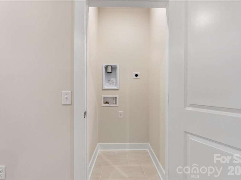 6008 Pivot Court, Charlotte, NC 28205.  MLS# CAR4396115, YatesRealty ID 18768. Laundry closet 