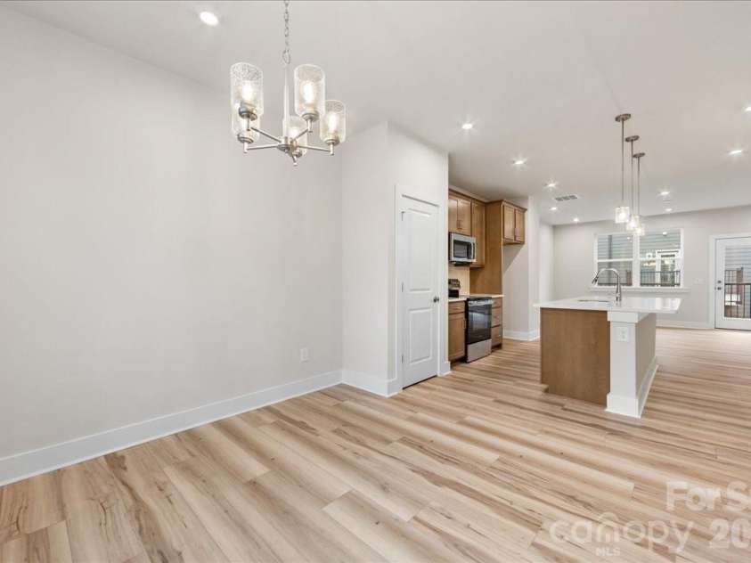 6008 Pivot Court, Charlotte, NC 28205.  MLS# CAR4396115, YatesRealty ID 18768. Light filled second floor