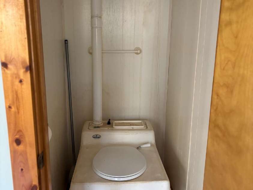 324 Marble Mine Road, Bakersville, NC 28705.  MLS# CAR4237907, YatesRealty ID 1877. Cabin 3 composting toilet