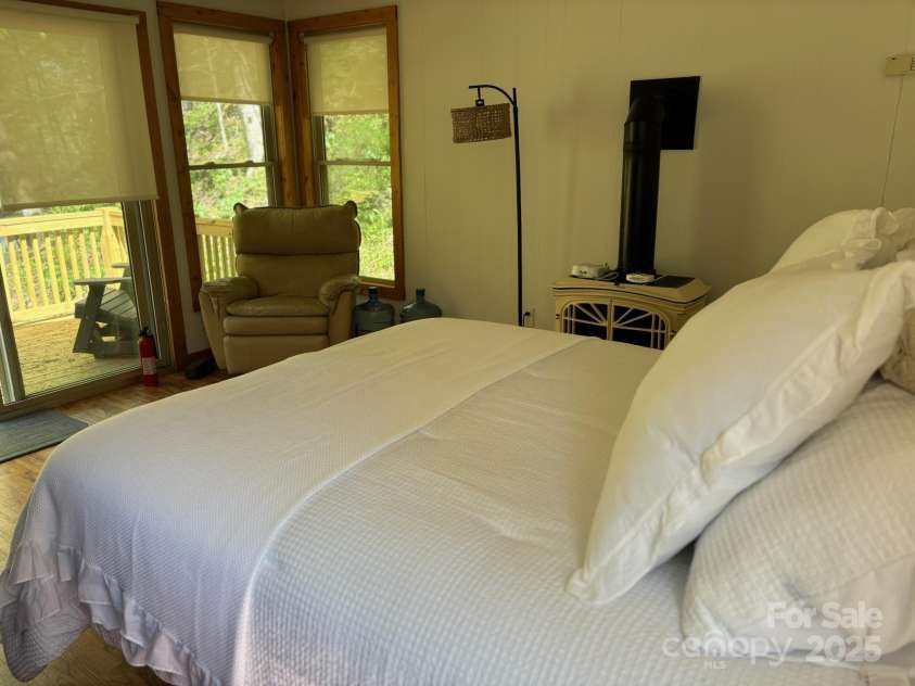 324 Marble Mine Road, Bakersville, NC 28705.  MLS# CAR4237907, YatesRealty ID 1877. Cabin across the creek