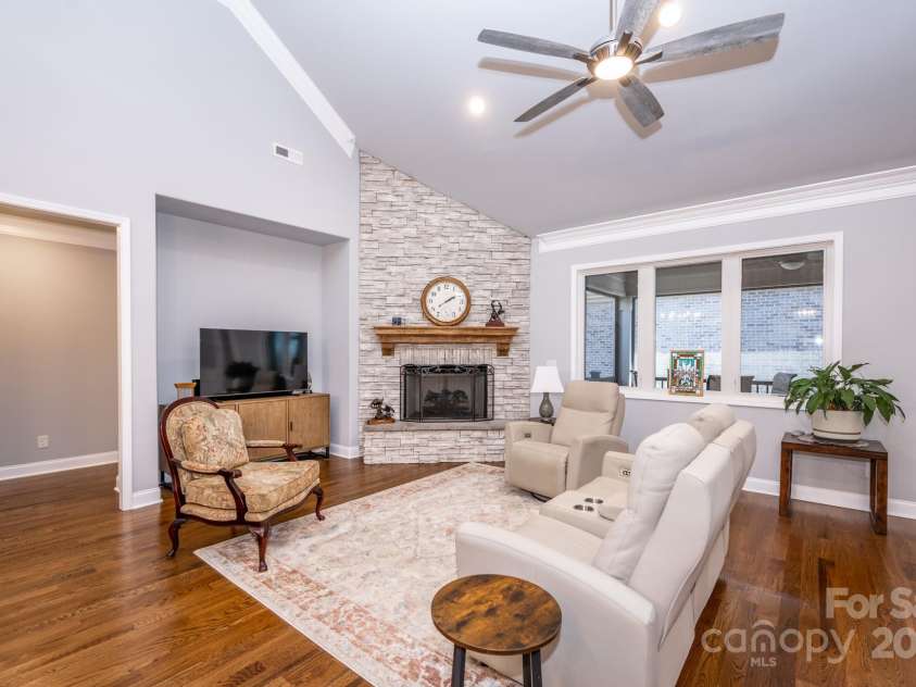 1422 Spring Ridge Lane, Denver, NC 28037.  MLS# CAR4209796, YatesRealty ID 18781. Family room w fireplace