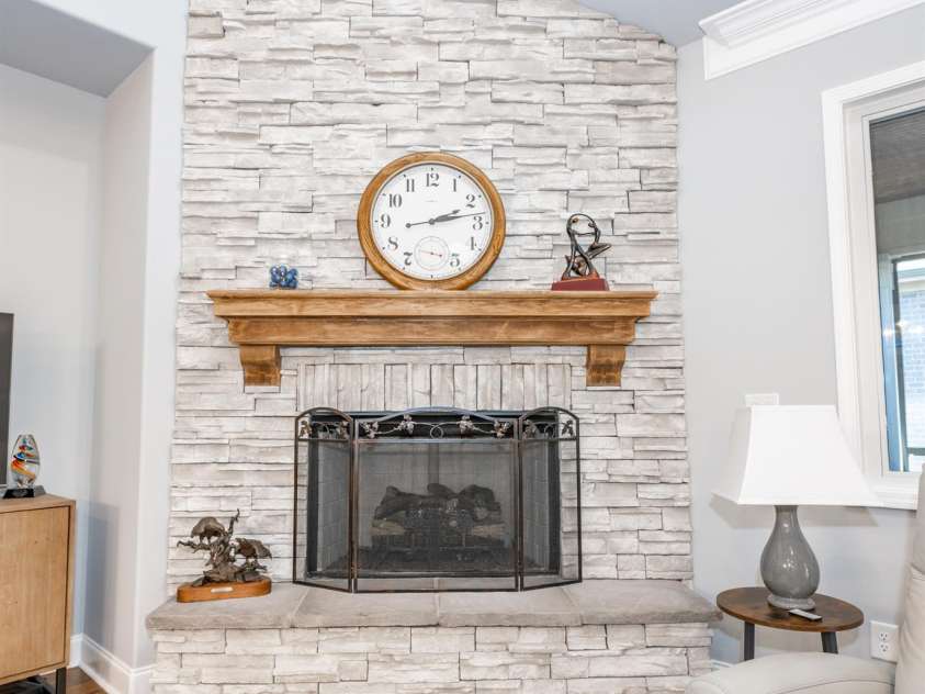 1422 Spring Ridge Lane, Denver, NC 28037.  MLS# CAR4209796, YatesRealty ID 18781. Stone facade gas fireplace