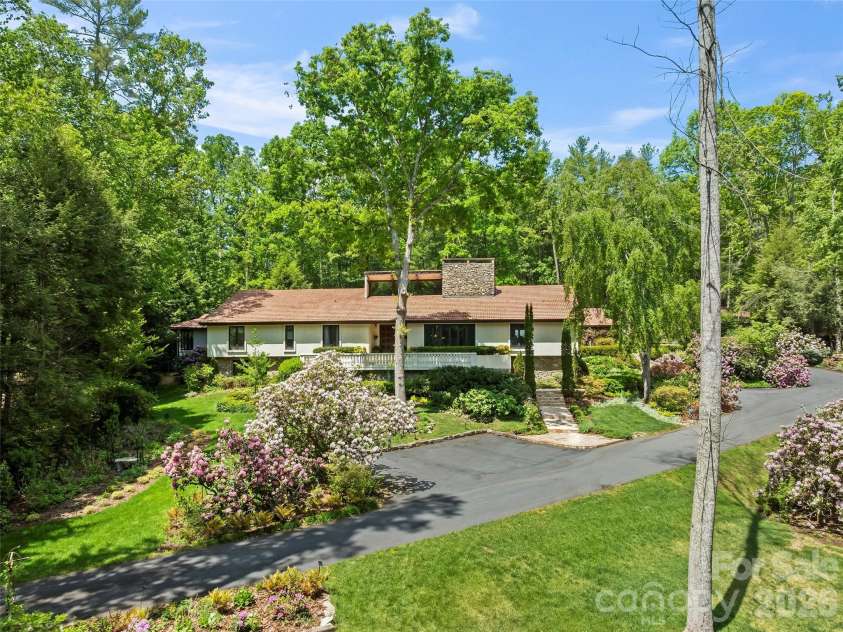 69 Forest Road, Asheville, NC 28803.  MLS# CAR4376506, YatesRealty ID 18781. Exterior View from Road
