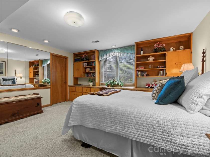69 Forest Road, Asheville, NC 28803.  MLS# CAR4376506, YatesRealty ID 18781. Lower Level Bedroom 5