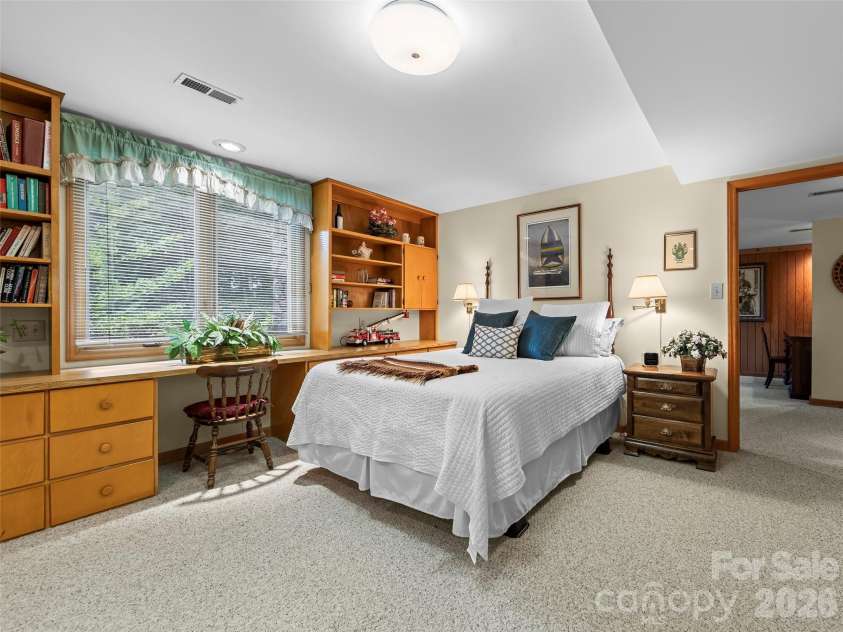 69 Forest Road, Asheville, NC 28803.  MLS# CAR4376506, YatesRealty ID 18781. Lower Level Bedrrom 5