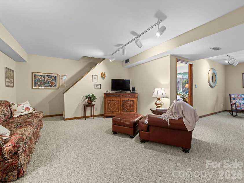 69 Forest Road, Asheville, NC 28803.  MLS# CAR4376506, YatesRealty ID 18781. Lower Level Recreation Room