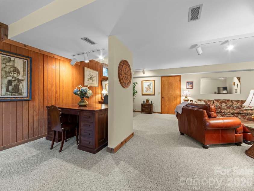69 Forest Road, Asheville, NC 28803.  MLS# CAR4376506, YatesRealty ID 18781. Lower Level Recreation Room