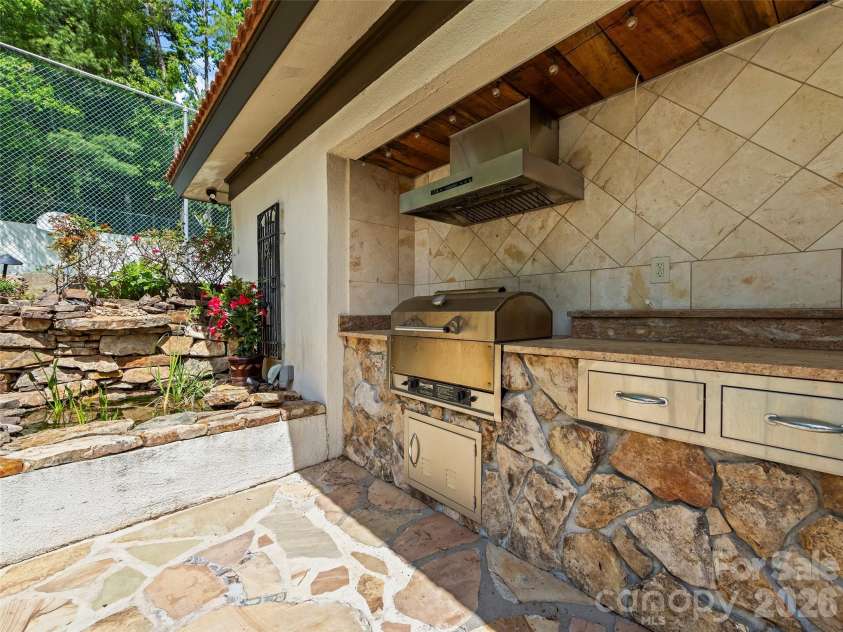 69 Forest Road, Asheville, NC 28803.  MLS# CAR4376506, YatesRealty ID 18781. Poolside Outdoor Kitchen