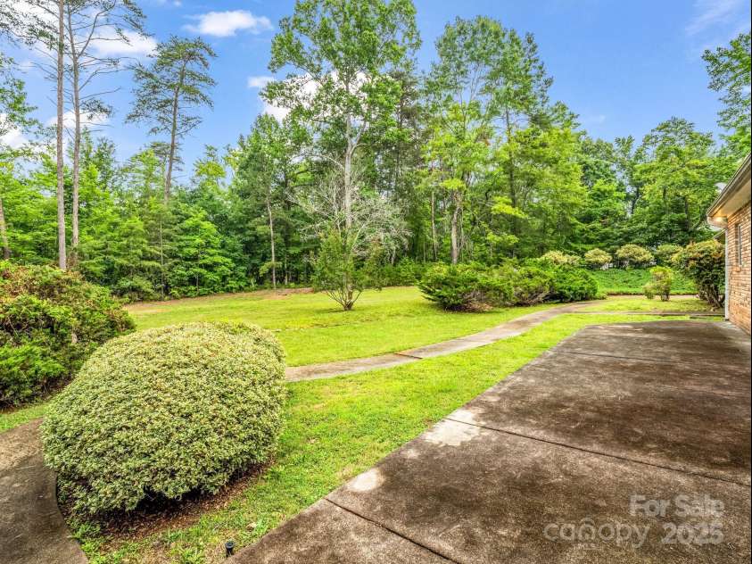 2000 Golf Course Road, Columbus, NC 28722.  MLS# CAR4268144, YatesRealty ID 18782. A lot of opportunity to customize back yard space.