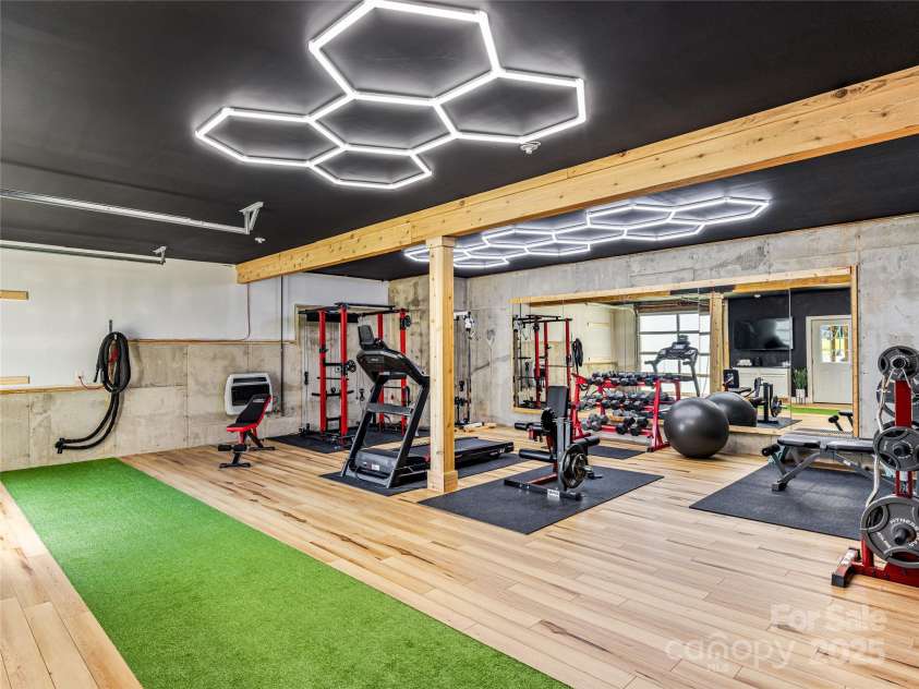 16 Pisgah Ridge Trail, Mills River, NC 28759.  MLS# CAR4257871, YatesRealty ID 18784. Full Gym in Lower Level.