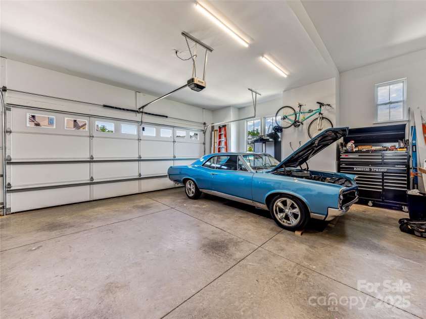 16 Pisgah Ridge Trail, Mills River, NC 28759.  MLS# CAR4257871, YatesRealty ID 18784. Garage on Main Level.