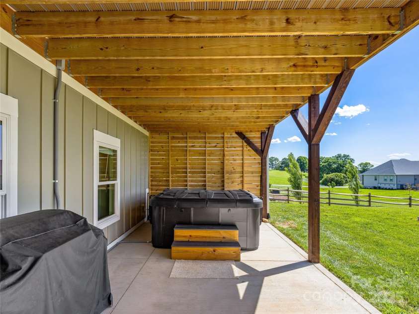 16 Pisgah Ridge Trail, Mills River, NC 28759.  MLS# CAR4257871, YatesRealty ID 18784. Hot Tub on Lower Covered patio.