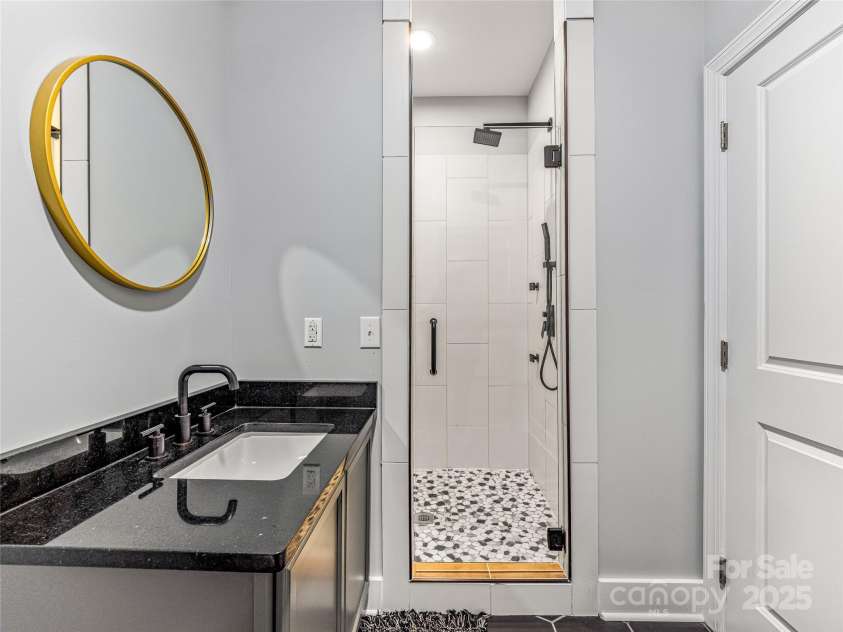 16 Pisgah Ridge Trail, Mills River, NC 28759.  MLS# CAR4257871, YatesRealty ID 18784. Lower Level Bathroom with Sauna.