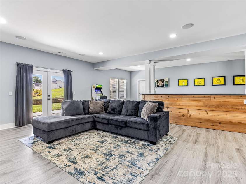 16 Pisgah Ridge Trail, Mills River, NC 28759.  MLS# CAR4257871, YatesRealty ID 18784. Lower Level Entertainment Space