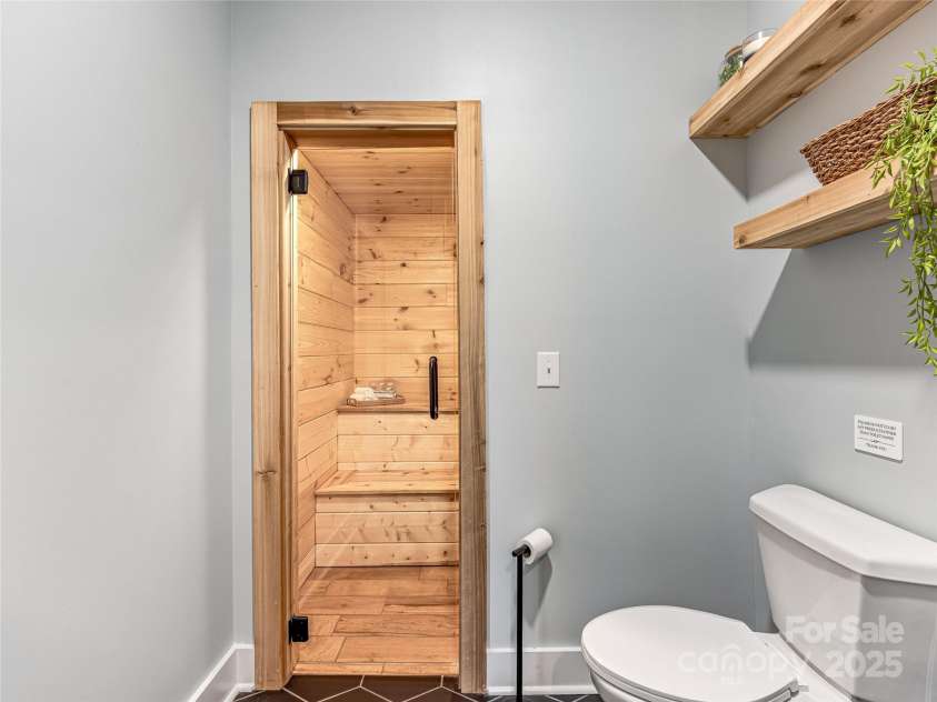 16 Pisgah Ridge Trail, Mills River, NC 28759.  MLS# CAR4257871, YatesRealty ID 18784. Sauna Through Lower Level Bathroom.