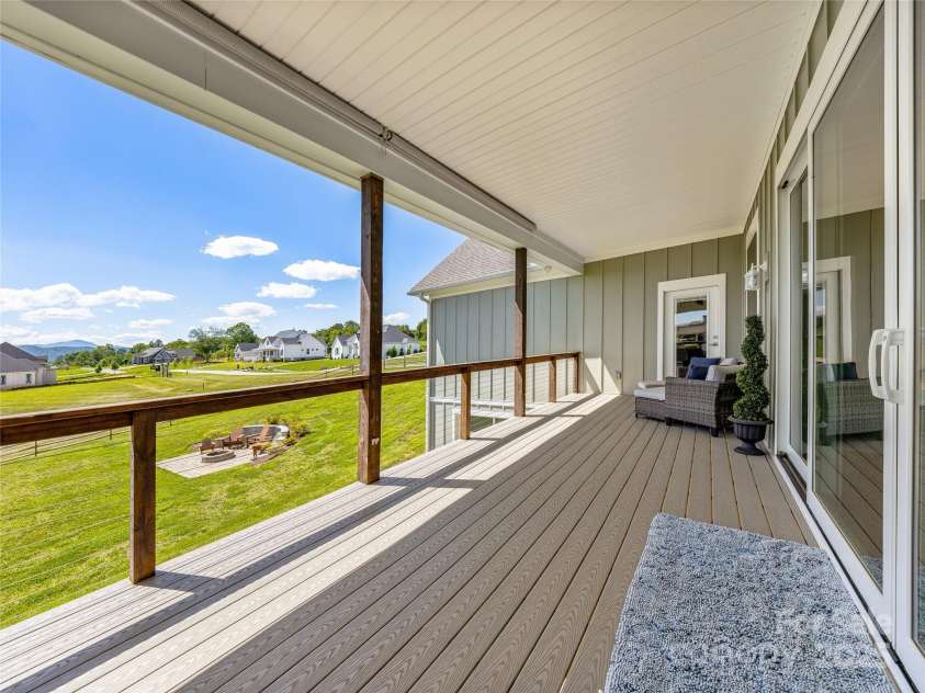 16 Pisgah Ridge Trail, Mills River, NC 28759.  MLS# CAR4257871, YatesRealty ID 18784. Upper Deck Accessible Through Main Level Living Room