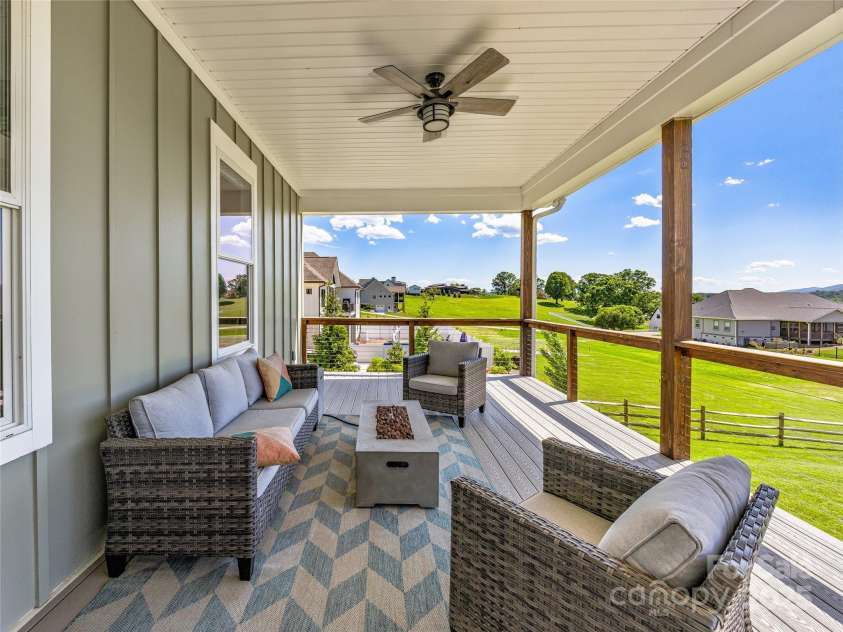 16 Pisgah Ridge Trail, Mills River, NC 28759.  MLS# CAR4257871, YatesRealty ID 18784. Upper Deck Accessible Through Main Level Living Room