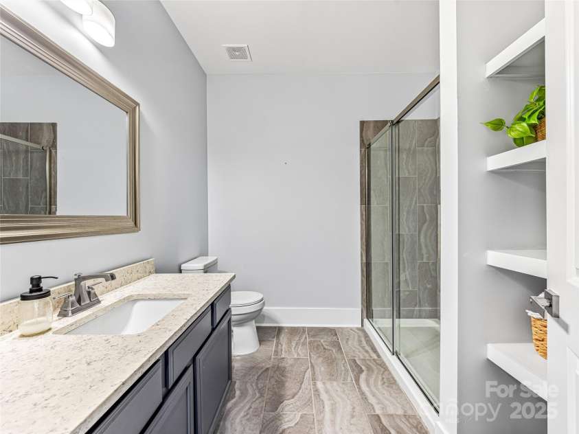 16 Pisgah Ridge Trail, Mills River, NC 28759.  MLS# CAR4257871, YatesRealty ID 18784. Upper Level Bathroom