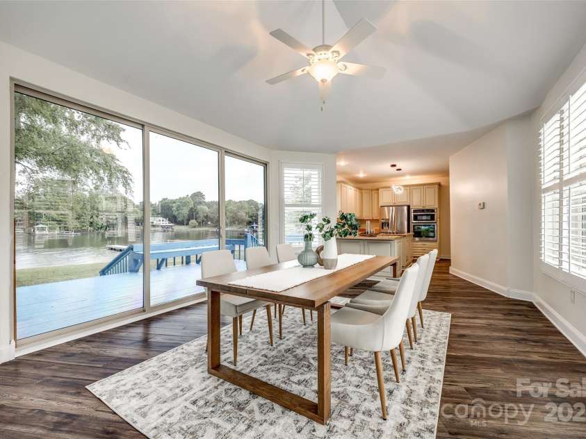3911 Sandy Point Drive, York, SC 29745.  MLS# CAR4258405, YatesRealty ID 18785. Dining room looks straight out onto the lake