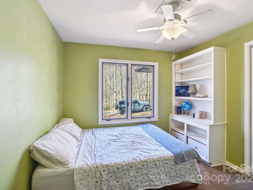 160 Lakota Lane, Tryon, NC 28782.  MLS# CAR4228822, YatesRealty ID 18789. Bedroom 1 with Built-in shelving