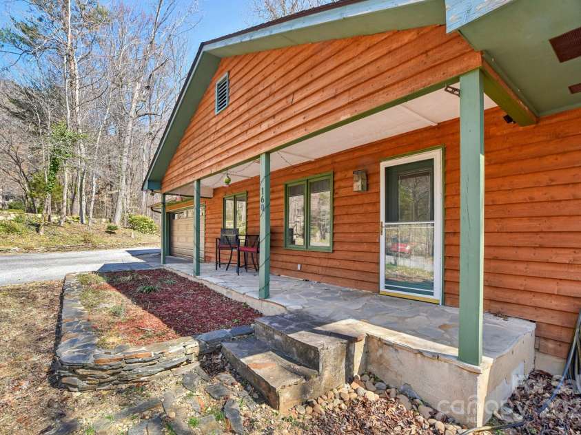 160 Lakota Lane, Tryon, NC 28782.  MLS# CAR4228822, YatesRealty ID 18789. Covered front porch