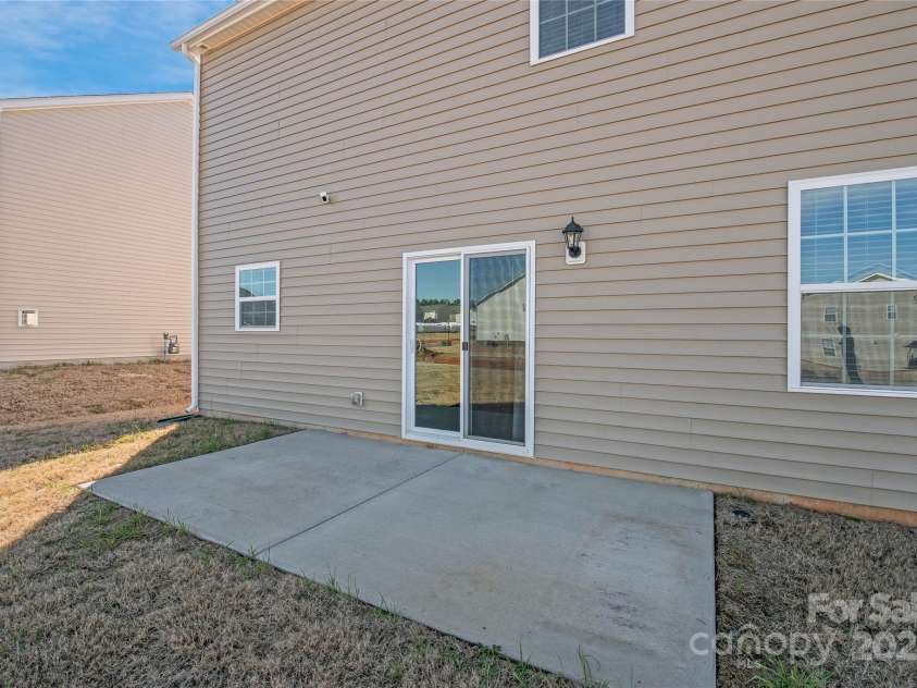 7324 Teague Drive, Gastonia, NC 28056.  MLS# CAR4217797, YatesRealty ID 18793. Back Patio