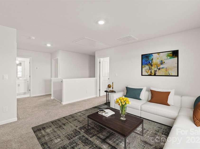 7324 Teague Drive, Gastonia, NC 28056.  MLS# CAR4217797, YatesRealty ID 18793. Loft at top of stairs, virtually staged