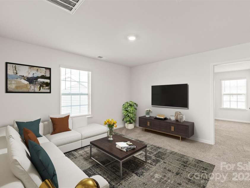 7324 Teague Drive, Gastonia, NC 28056.  MLS# CAR4217797, YatesRealty ID 18793. Loft at top of stairs, virtually staged